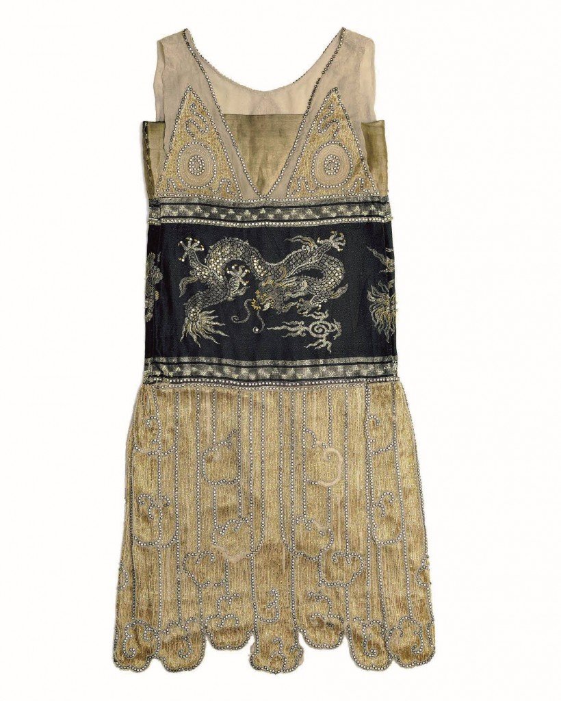 T.50-1948 Evening dress; navy & gold silk beaded with Chinese Dragon motifs; back view;  by Paquin; made for & displayed at The Pavillon de L`El√©gance, Paris Exhibition, 1925;  French (Paris);  1925.