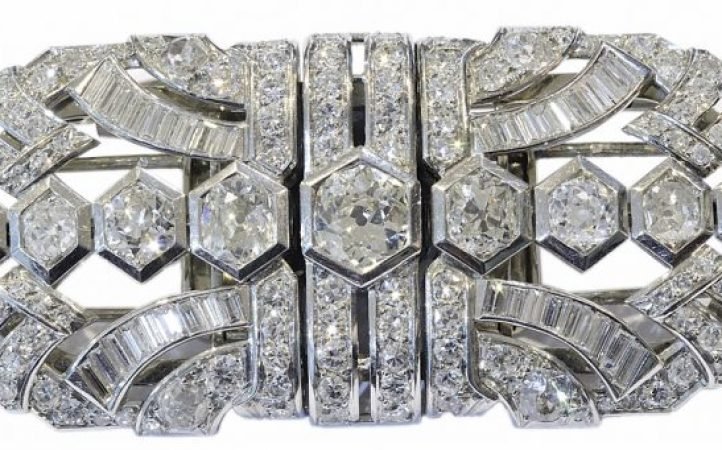 Importante-broche-doble-clip-desmontable-en-platino-y-brillantes.-Años-50.jpg